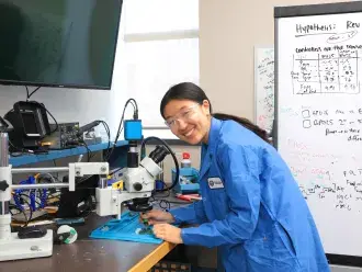 Employee works on a circuit.