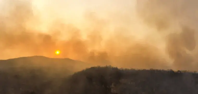 smokey sky above mountains