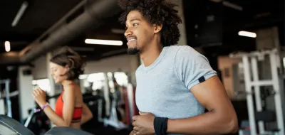 Photo of person running at the gym