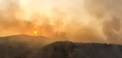 smokey sky above mountains