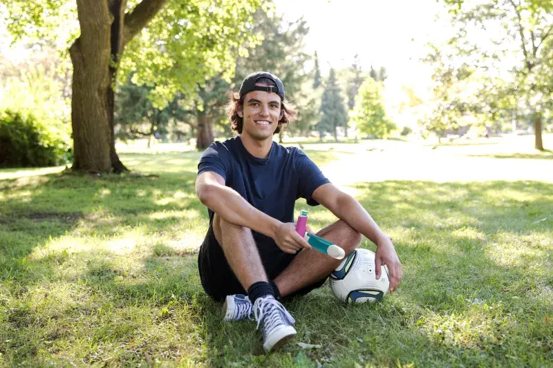 young man with a soccer ball