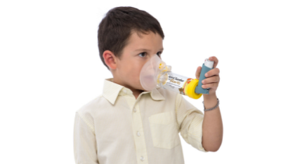 AeroChamber Plus Flow Vu Chamber yellow child in use by boy