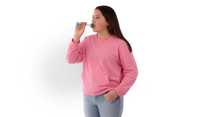 TruZone Peak Flow Meter being used by a woman