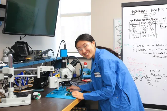 Employee works on a circuit.